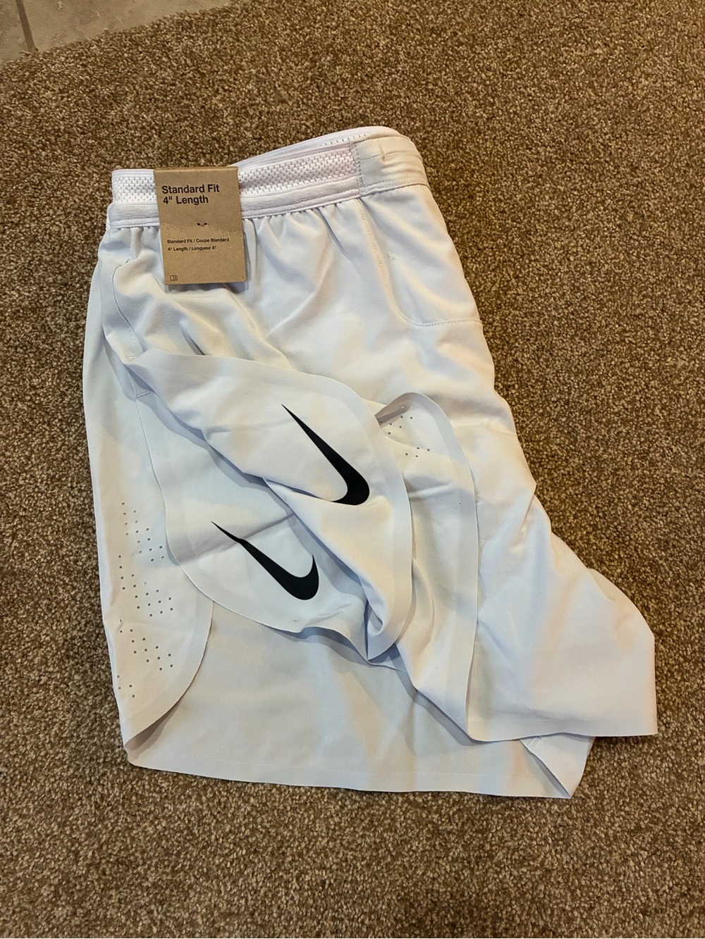 Nike White (slightly lavender) Men’s Running Shorts with Black Swoosh Accents